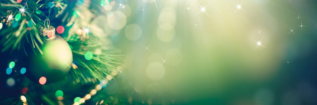 Decorated Christmas tree on glowing background