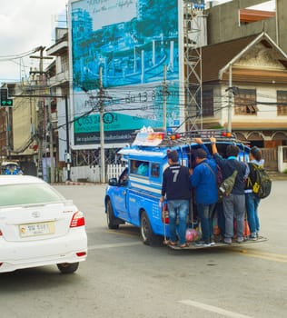 CHIANG MAI, THAILAND - JANUARY 17, 2017: People on overloaded city bus in Chiang Mai. Chiang Mai is the second largest city in Thailand