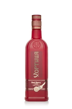 St.Petersburg, Russia - May 2019 - Bottle of vodka Khortytsa Red Berry on a white background with reflection. Premium vodka.