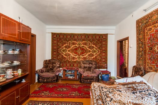 Russia, Moscow- June 26, 2019: interior room apartment. standard repair decoration in hostel. old not modern decor. kitchen and dining room