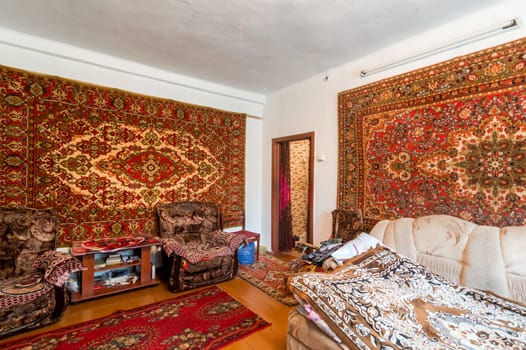 Russia, Moscow- June 26, 2019: interior room apartment. standard repair decoration in hostel. old not modern decor. kitchen and dining room