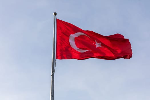 National Flag of Turkey in the windy sky, Istanbul.