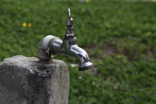 SALVADOR, BAHIA / BRAZIL - September 27, 2013: Faucet pours the last drops of water due to lack of supply.