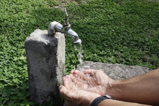 SALVADOR, BAHIA / BRAZIL - September 27, 2013: Faucet pours the last drops of water due to lack of supply.(Joa Souza)...