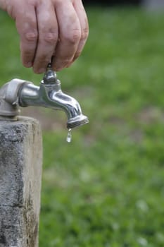 SALVADOR, BAHIA / BRAZIL - September 27, 2013: Faucet pours the last drops of water due to lack of supply.