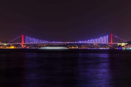 The Bosphorus Bridge or the 15 July Martyr's bridge, night panorama, Istanbul.