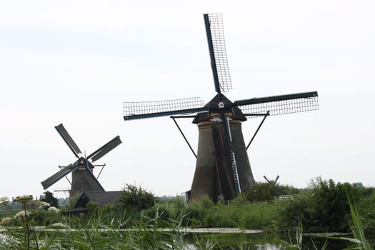 A beautiful, old, historic windmill, with four wings