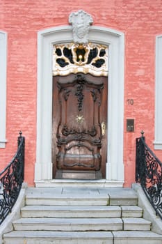 an old carved wooden door pattern with imagination