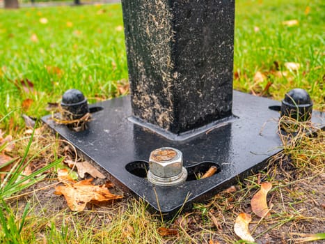 The nut is screwed onto the bolt. Street post mount. Place for text.