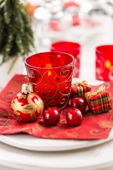 Christmas And New Year Holiday Table Setting. Celebration. Place setting for Christmas Dinner. Holiday Decorations. Decor.