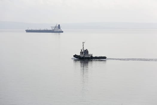 Tugboat at Calm Adriatic Sea in Croatia