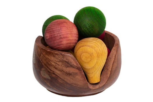 Air fresheners. Closeup of the air freshener in a brown wooden bowl made of wooden balls and aromatized with essential oils. Macro of a nice gift isolated on a white background.
