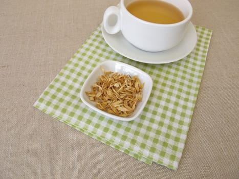 Orange blossom tea and dried orange blossoms of sweet orange