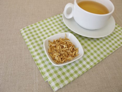 Orange blossom tea and dried orange blossoms of sweet orange