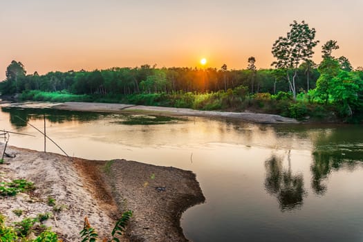 View water river tree and sunset or sunrise, Land river in multi color tree leaf in sunlight