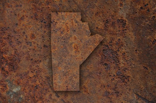Map of Manitoba on rusty metal