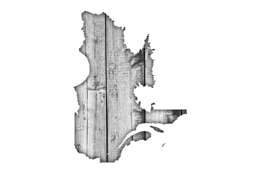 Map of Quebec on weathered wood