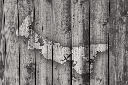 Map of Prince Edward Island on weathered wood