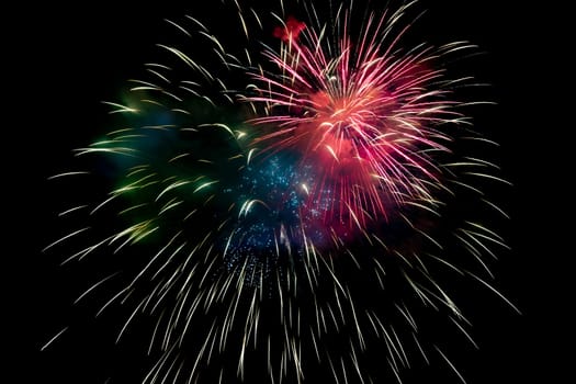 Red Green Blue Sparkling Fireworks Background on Night Scene. Abstract color fireworks background and smoke on sky