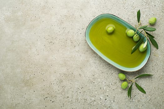 Healthy olive oil with olives background close up. Healthy concept