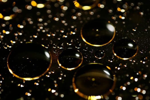Golden oil bubbles macro on water background with bokeh fifty megapixels prints