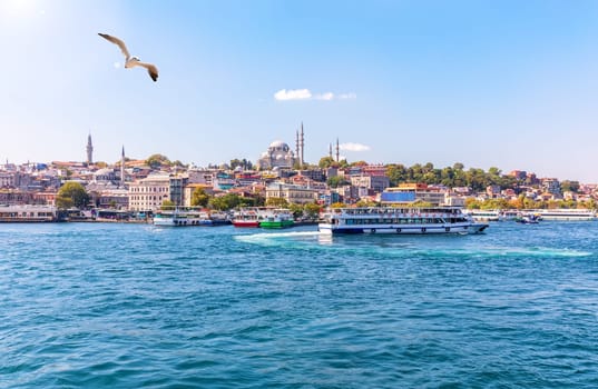 Eminonu pier, the Suleymaniye Mosque and the Bosphorus, Istanbul view.