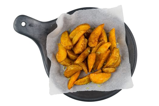 French fries on a black ceramic tray, top view. Isolated on white background.