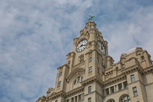 Liverpool's Historic Liver Building and Clocktower, Liverpool, England, United Kingdom. Liverpool, in North West England, is a major city and metropolitan borough with population of 478,580 in 2015.