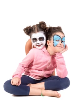 Children with animal face-paint isolated in white