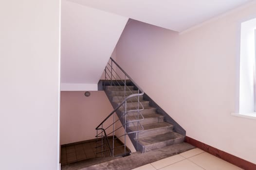 Russia, Moscow- July 06, 2019: interior room apartment. standard repair decoration in hostel. stairs, steps