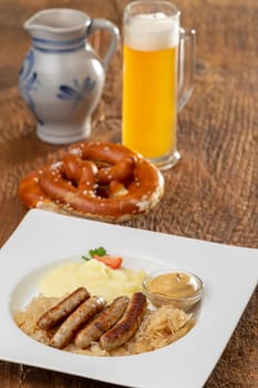 grilled nuremberger bratwurst with sauerkraut