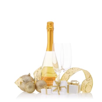 Bottle of muscat white young sparkling wine Chateau Tamagne 2018, gift boxes and Christmas ornaments isolated on a white background. New Year and Christmas