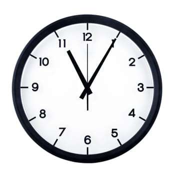 Classic analog clock pointing at eleven O five, isolated on white background.