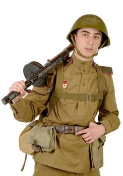 young Soviet soldier with machine gun on the white background