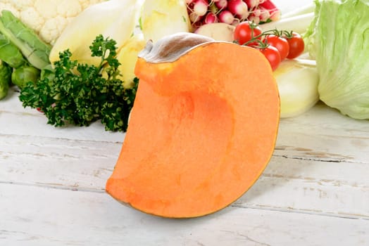 piece of pumpkin with different vegetables