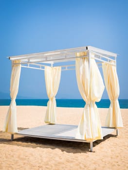 Square gazebo on a tropical beach