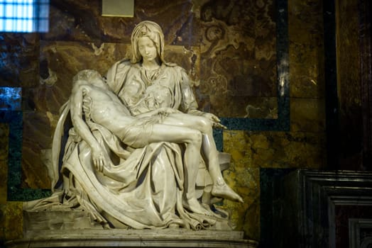 Rome, Italy, - January 04, 2015: la pieta' the famous michelangelo's work inside san pietro church in rome italy