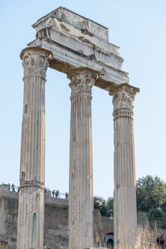 Ruins buildings and statue in the foro romano in Rome italy