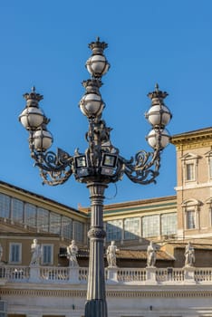 Particulars of San Pietro Church and the column in the square, Rome Italy, Lamp