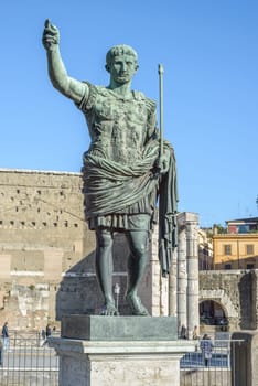 Ruins buildings and statue in the foro romano in Rome italy, emperor cesare