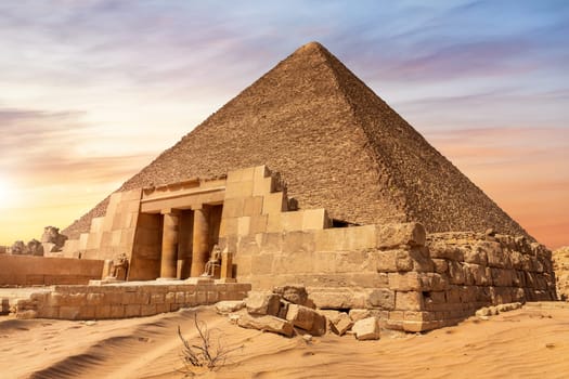 The Pyramid of Cheops and the temple entrance, Giza, Egypt.