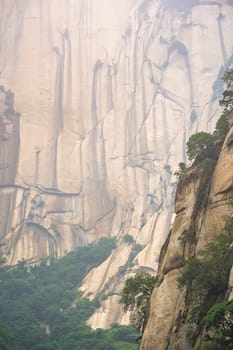 Close up of the rocky hillside of the inspiring, sacred and majestic Huashan mountain, famous tourist attractions, Shaanxi province, China