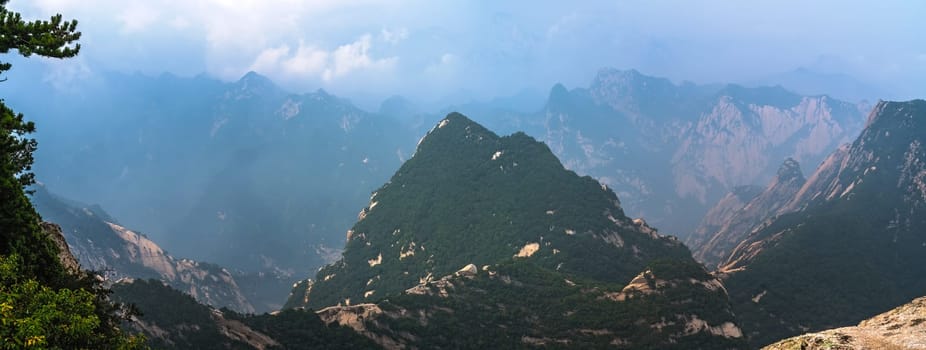 Panoramic view from the West Peak summit of the inspiring, sacred and majestic Huashan mountain, famous tourist attraction, Shaanxi province, China