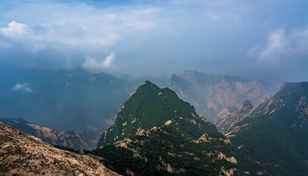 Panoramic view from the West Peak summit of the inspiring, sacred and majestic Huashan mountain, famous tourist attraction, Shaanxi province, China
