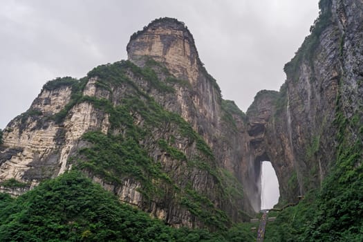 View of the holy sacred Tianmen Mountain on a rainy summer day, the Zhangjiajie National Park, Hunan Province, China