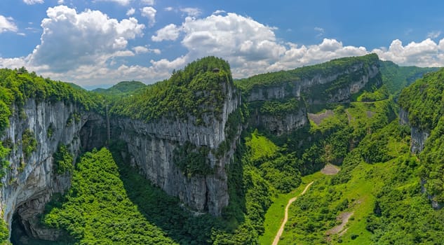Panorama of the gorge valley and karst limestone rock formations in Wulong National Park, China