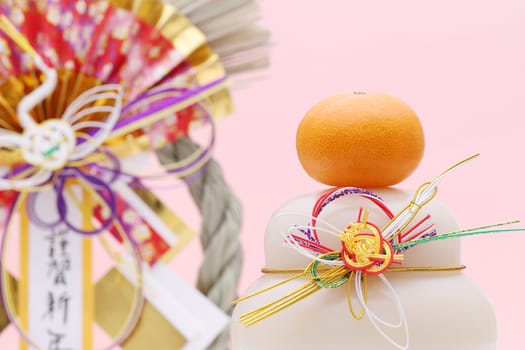 Traditional Japanese new year decoration Kagamimochi, Japanese word of this photography means "happy new year"""