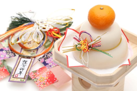 Japanese new year decoration Kagamimochi, Japanese word of this photography means "happy new year"""