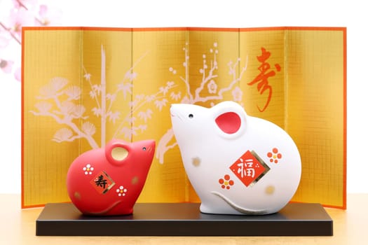 Dolls of Nezumi Mouse. Japanese new year card. Japanese new year Mouse object. Japanese word of this photography means "celebration or congraturations"""