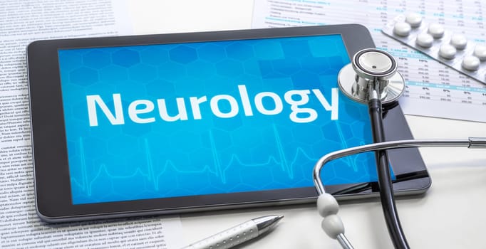 The word Neurology on the display of a tablet